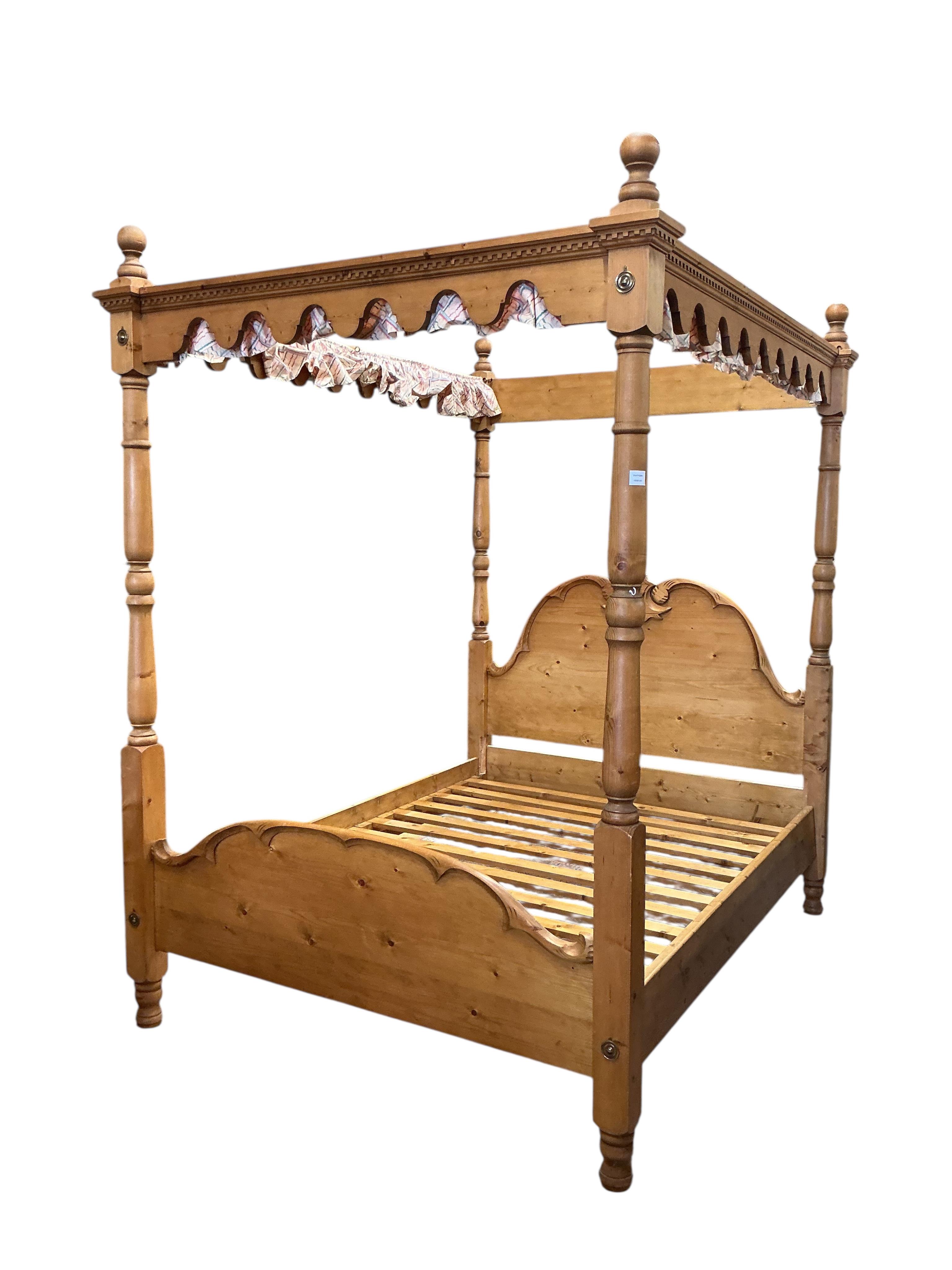 A Victorian style pine four poster double bed, length 212cm, width 166cm, height 240cm